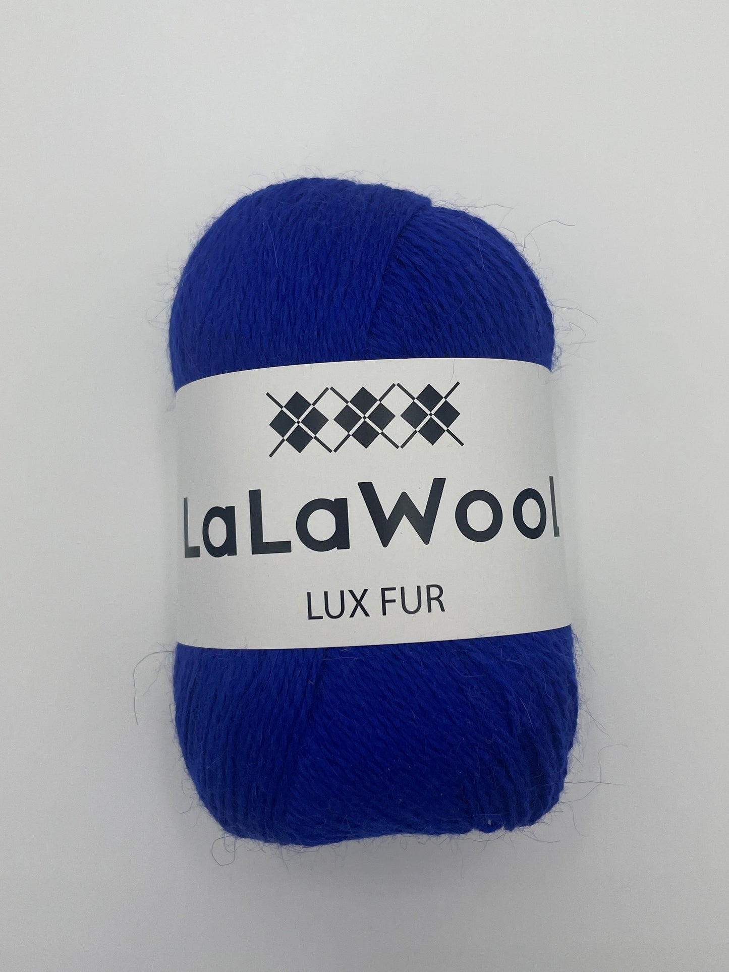 Angora Fingering Yarn Lux Fur in Cobalt Blue Colour, top view of one skein with LaLaWool tag, white background