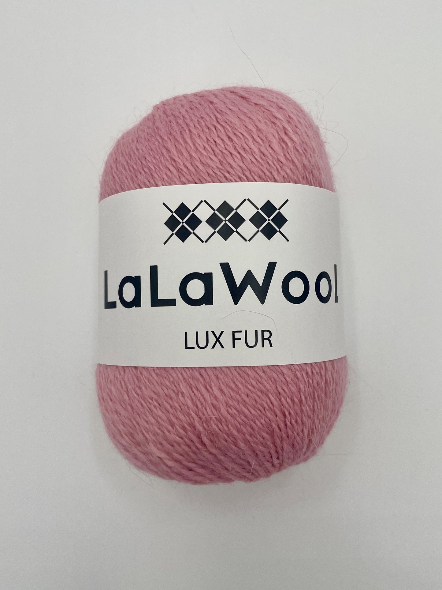 Angora Fingering Yarn Lux Fur in Cherry Blossom Pink Colour, top view of one skein with LaLaWool tag, white background