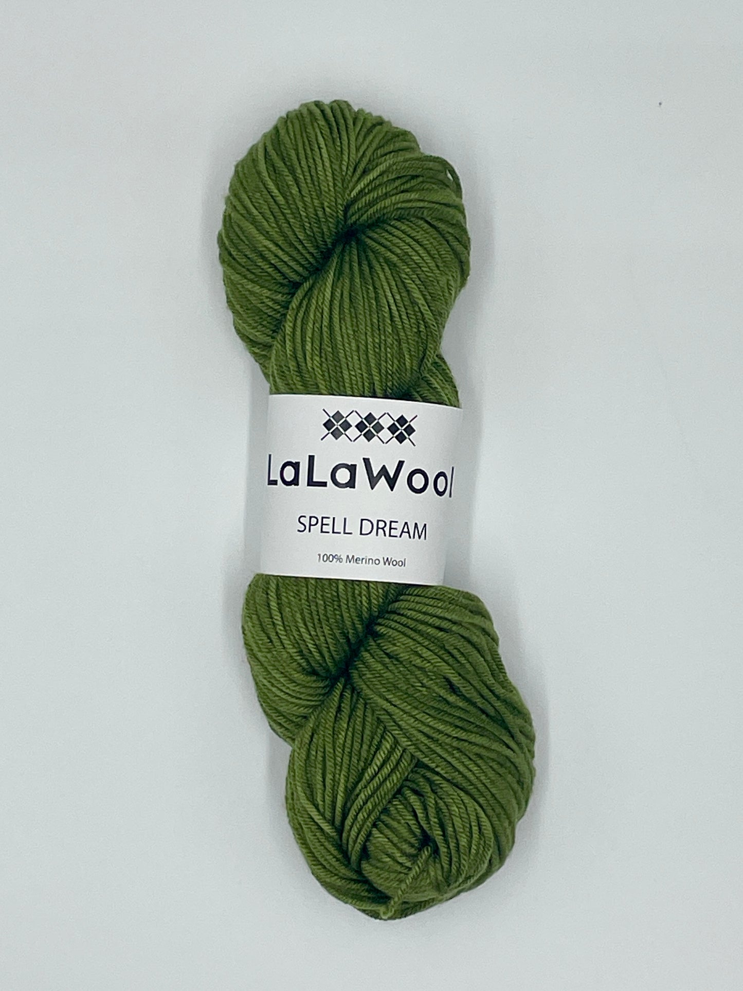100% Australian Merino Spell Dream Worsted Yarn in Green Sage Colour, top view of one skein with LaLaWool tag