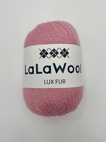 Angora Fingering Yarn Lux Fur in Cherry Blossom Pink Colour, top view of one skein with LaLaWool tag, white background