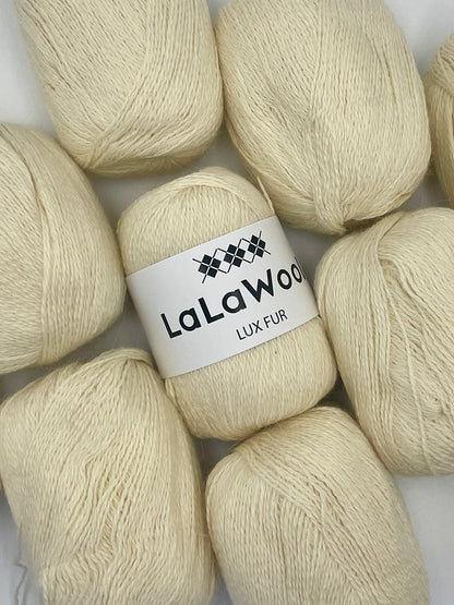 Angora Fingering Yarn Lux Fur in Icing Beige Colour, top view with multiple skeins with LaLaWool tag, white background