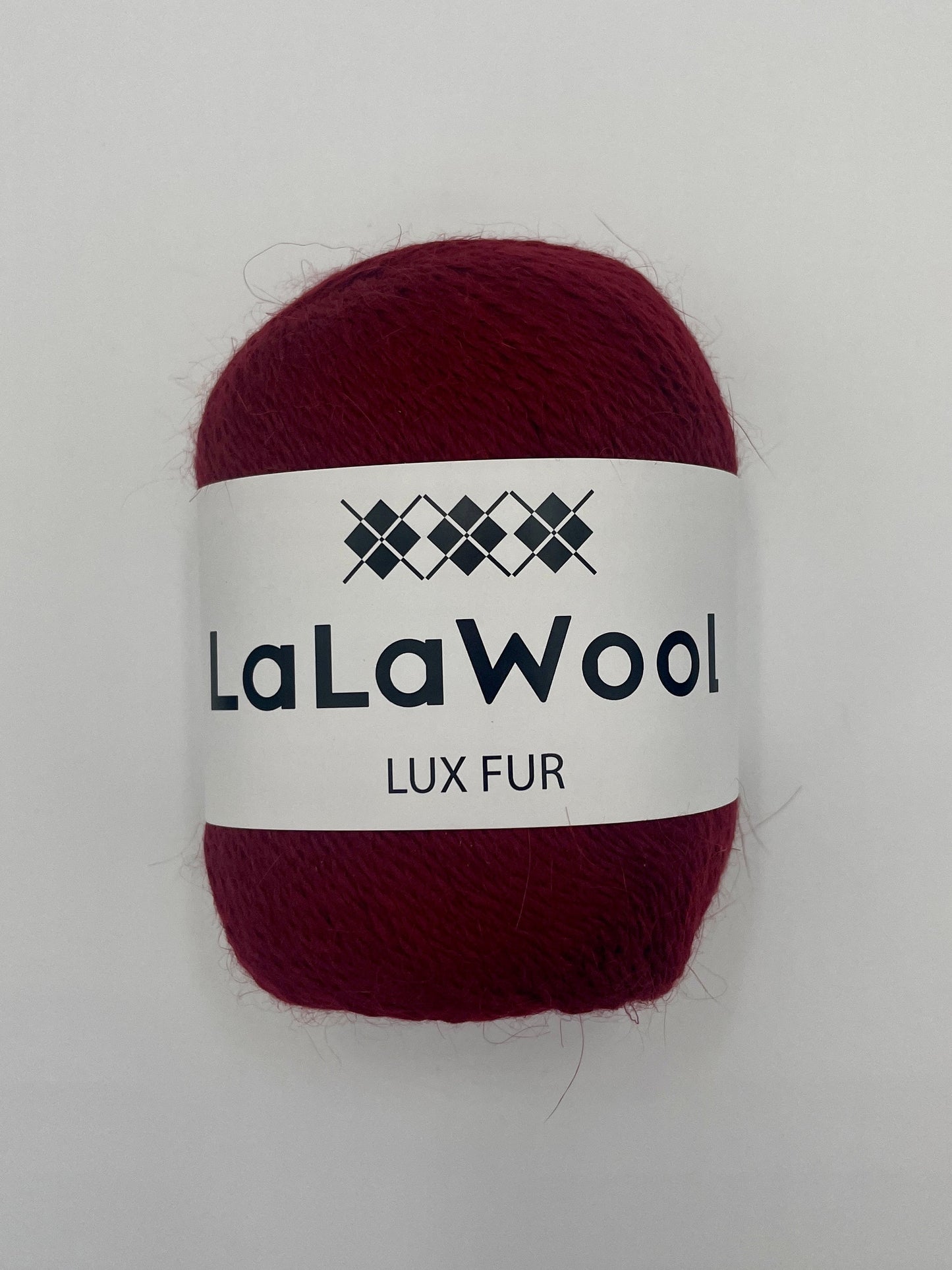 Angora Fingering Yarn Lux Fur in Burgundy Red Colour, top view of one skein with LaLaWool tag, white background