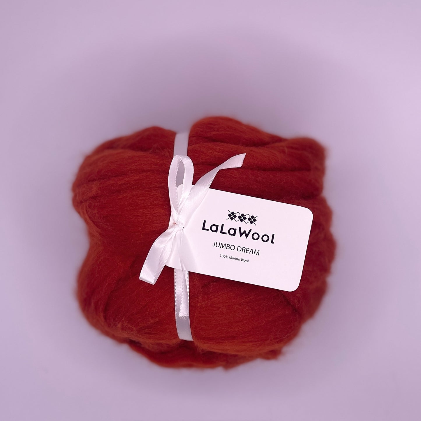 100% Australian Merino Chunky Jumbo Dream Blood Orange Yarn, single ball side view