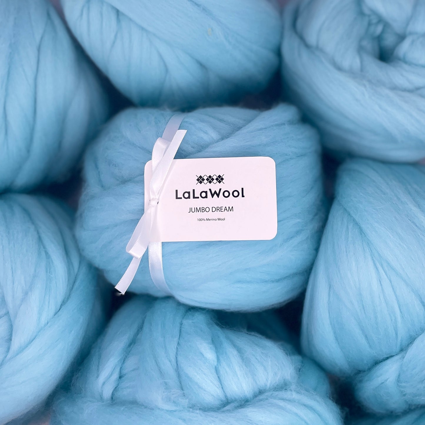 100% Australian Merino Chunky Jumbo Dream Blue Sky Yarn, top view with multiple balls