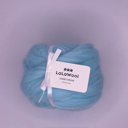 100% Australian Merino Chunky Jumbo Dream Blue Sky Yarn, single ball side view with tag