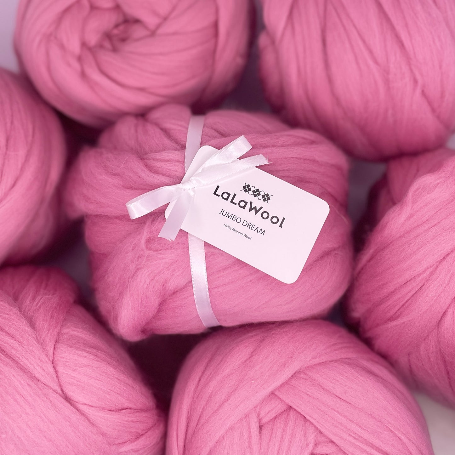100% Australian Merino Chunky Jumbo Dream Pink Blush Yarn, top view with multiple balls