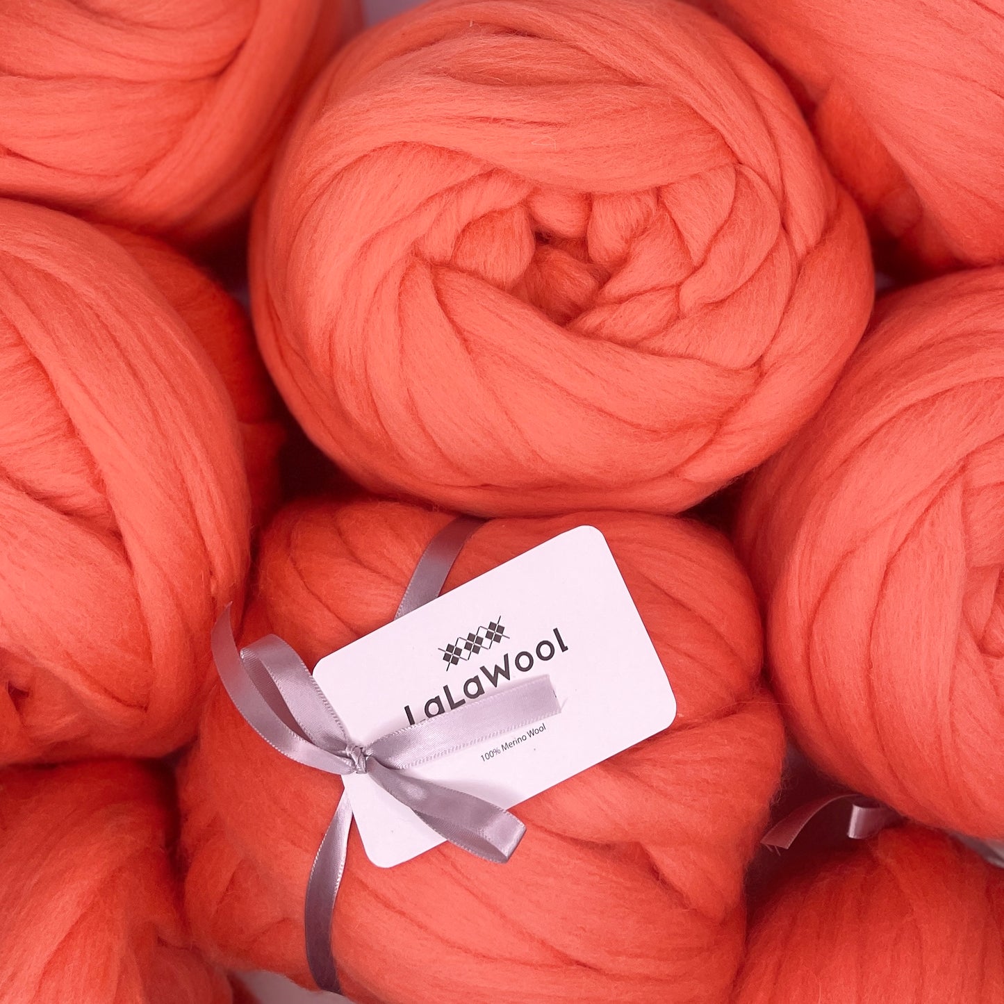 100% Australian Merino Chunky Jumbo Dream Sweet Orange Yarn, top view with multiple balls