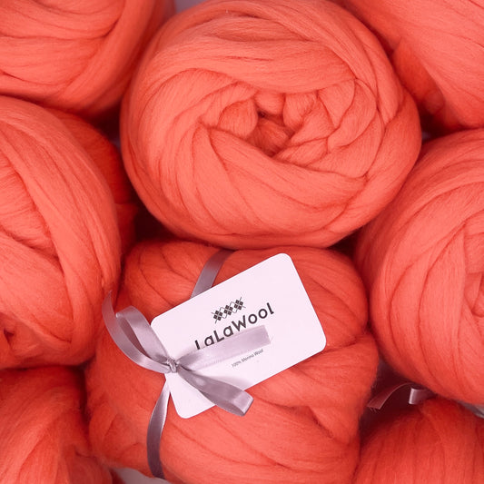 100% Australian Merino Chunky Jumbo Dream Sweet Orange Yarn, top view with multiple balls