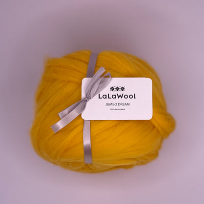 100% Australian Merino Chunky Jumbo Dream Yellow Mango Yarn, single ball with tag, side view