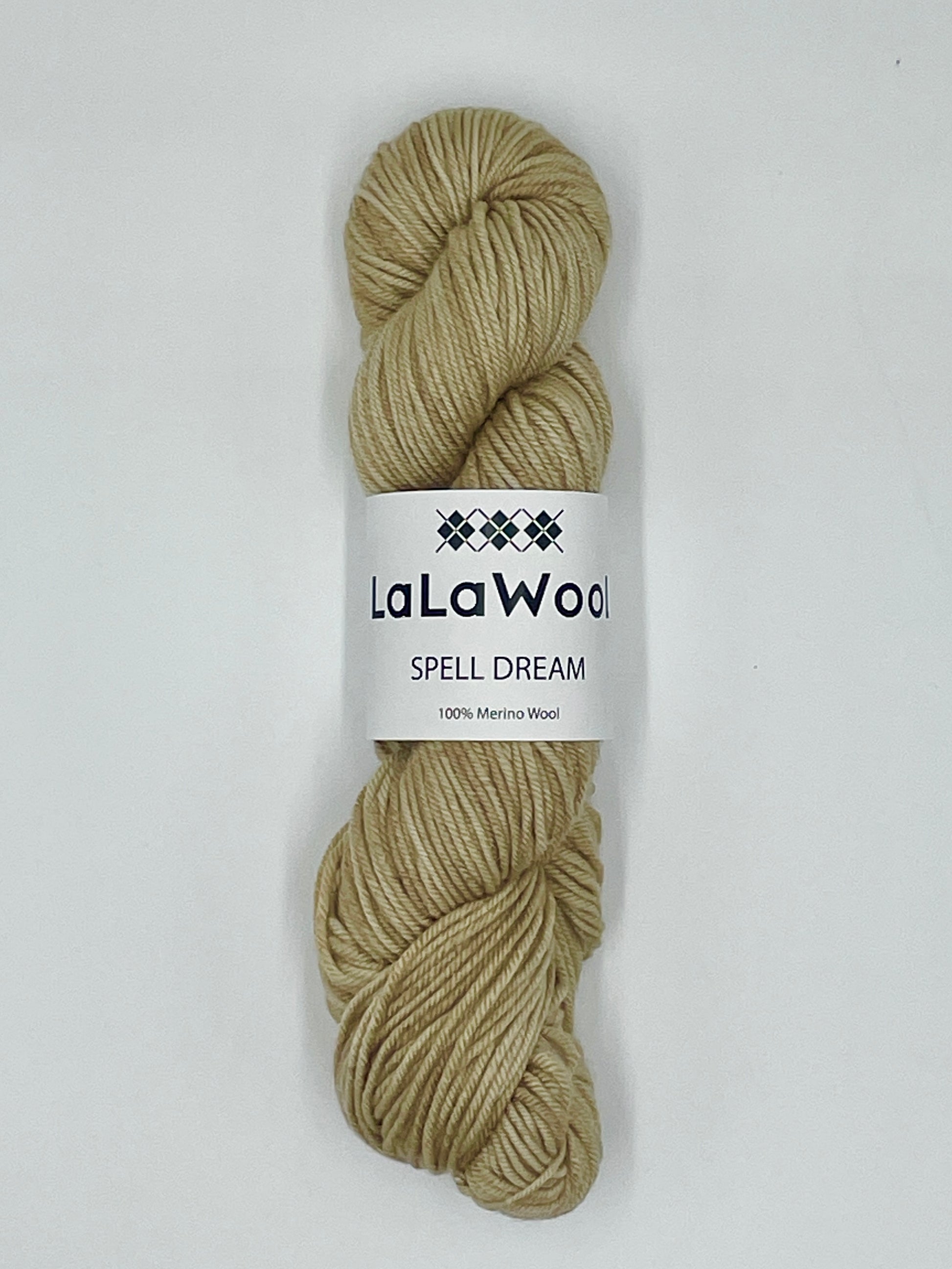 100% Australian Merino Spell Dream Worsted Yarn in Beige Oat Colour, top view of one skein with LaLaWool tag