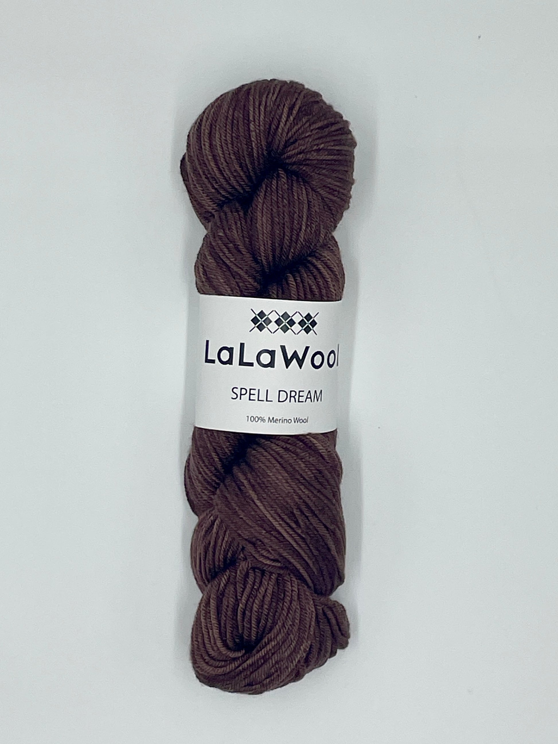 100% Australian Merino Spell Dream Worsted Yarn in Brown Cacao Colour, top view of one skein with LaLaWool tag